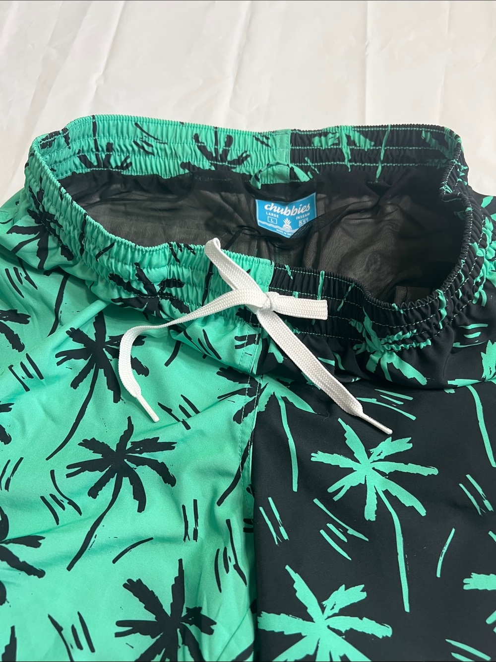 Chubbies Two-Tone Mint and Black Palm Swim Shorts